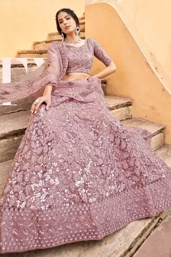 Purple net wedding wear lehenga choli set with embroidery & sequin work