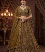 Captivating Green Embroidered Net Wedding Wear Lehenga Choli