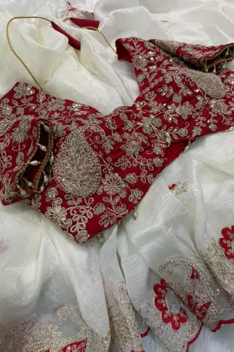 white organza tissue saree with heavy embroidery