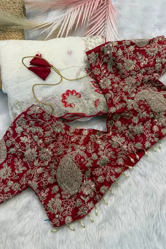 white organza tissue saree with heavy embroidery