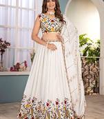 Fantastic Off-White Embroidered Net Wedding Wear Lehenga Choli