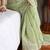 pastel green shimmer silk saree with embroidered border