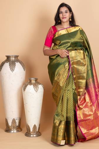 Forest green and rani pink kanjivaram pattu saree