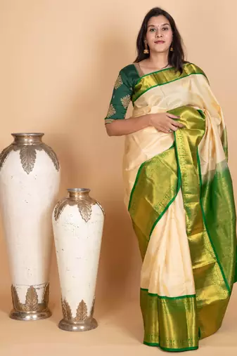 Parchment white and emerald green pure kanjivaram silk saree