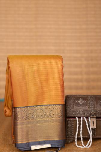 Mustard yellow and charcoal grey small checked soft silk saree