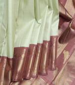 Tea green and chocolate pure zari silk saree