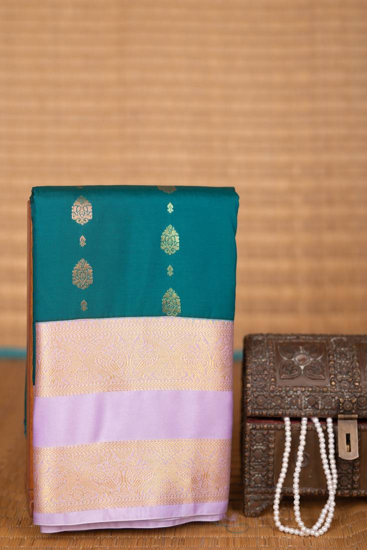 Teal blue and pastel lavender butta semi silk saree