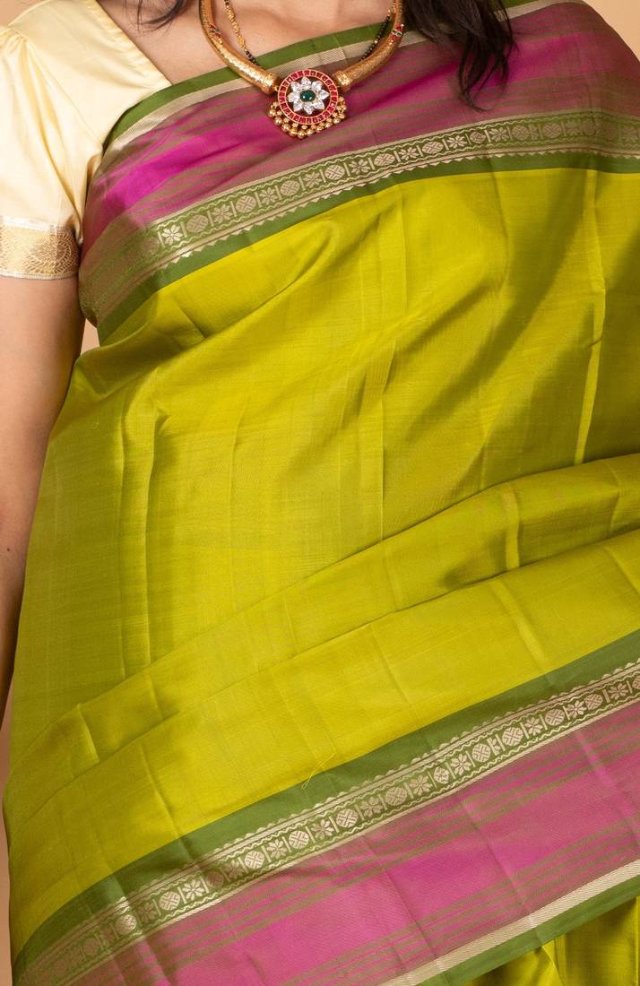 Parrot green and pickle green zero zari kanjivaram silk saree