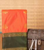 Neon orange and bottle green semi silk saree