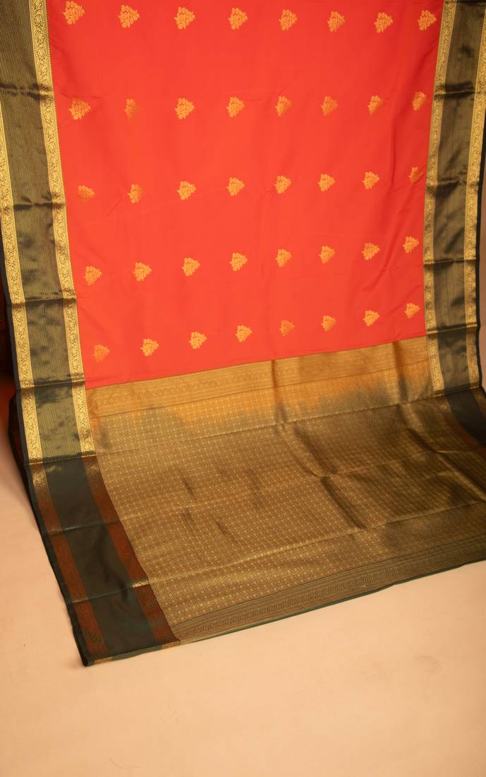 Neon orange and bottle green semi silk saree
