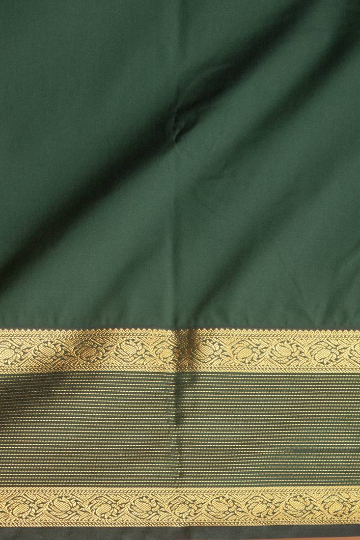 Neon orange and bottle green semi silk saree