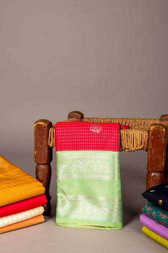 Aqua green and reddish pink semi silk saree