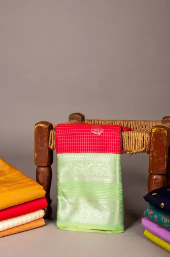 Aqua green and reddish pink semi silk saree