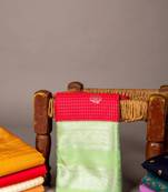 Aqua green and reddish pink semi silk saree