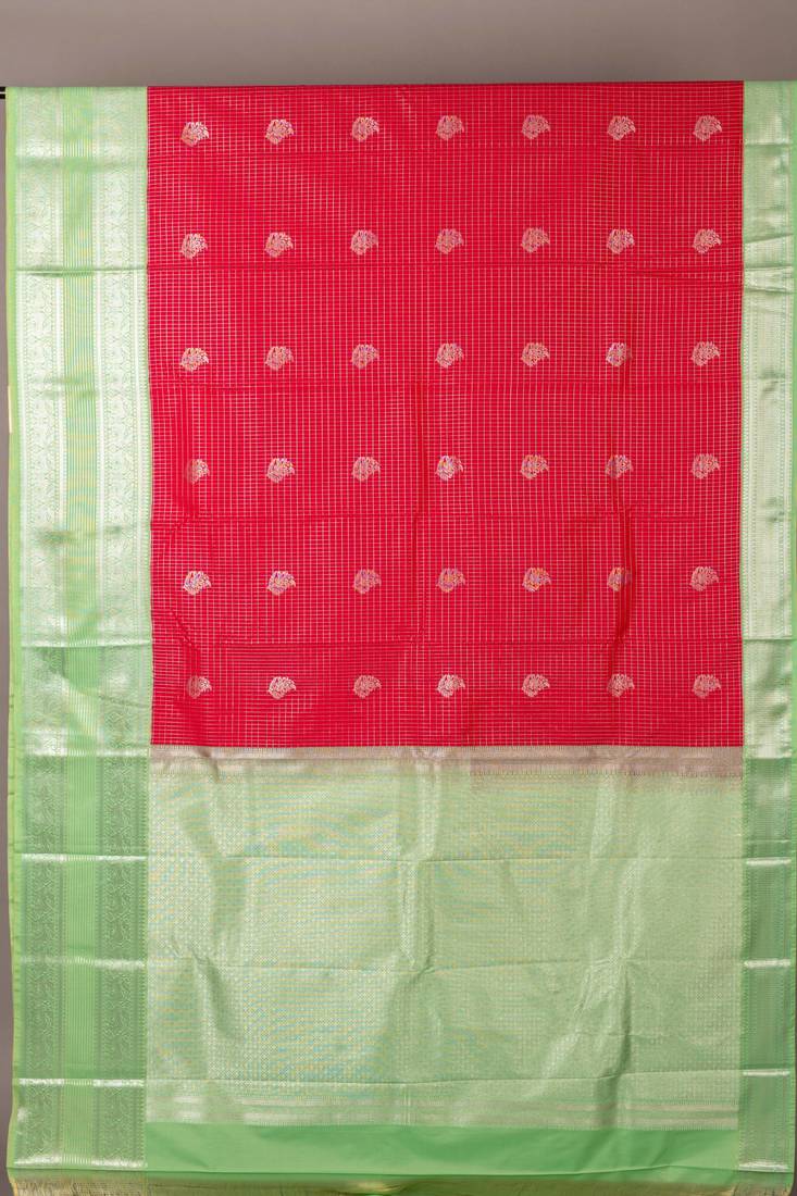 Aqua green and reddish pink semi silk saree