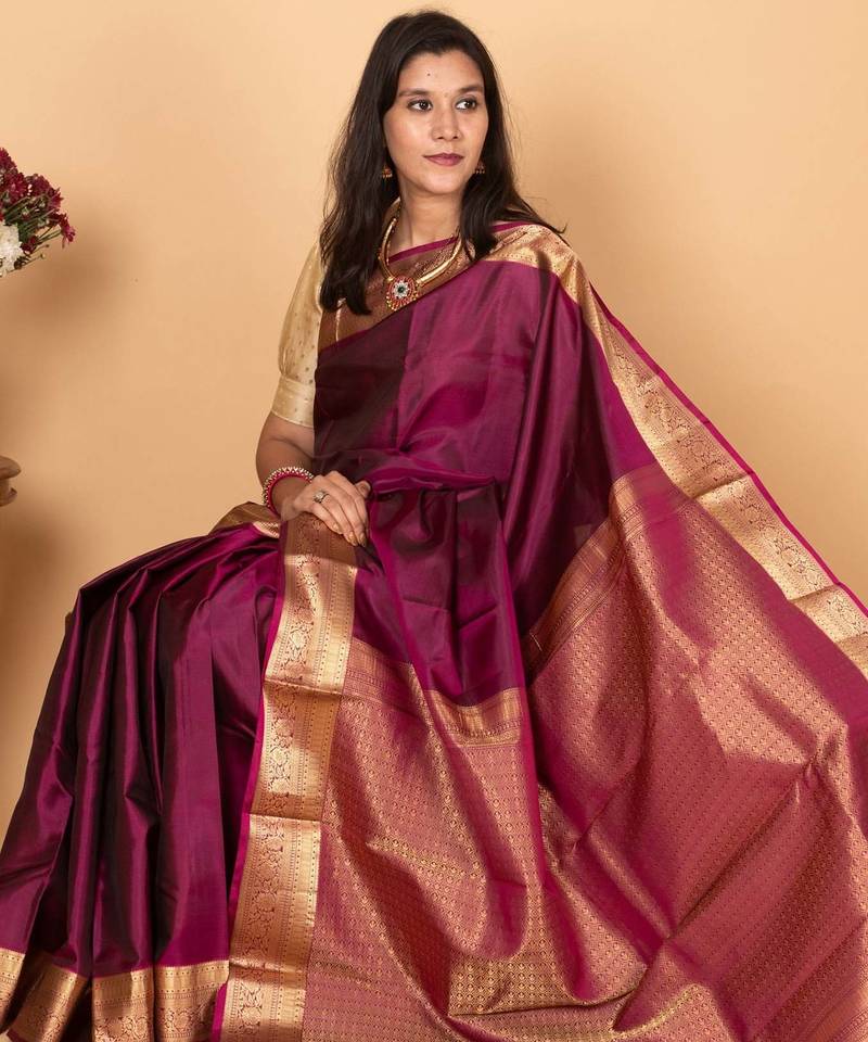 Purple brocade blouse pure kanchi silk saree