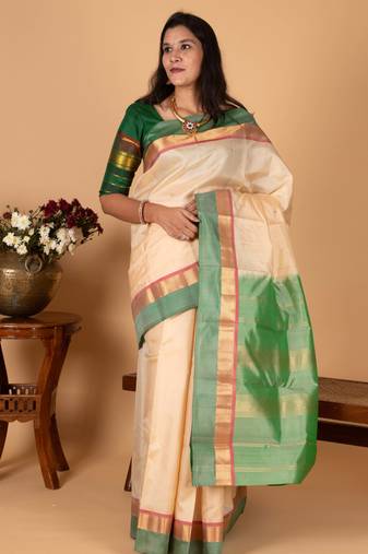Cream white and dual tone green pure kanjivaram silk saree