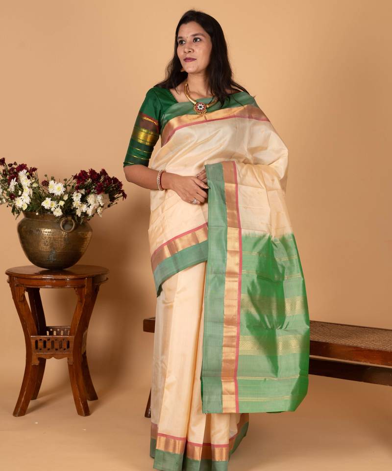 Cream white and dual tone green pure kanjivaram silk saree