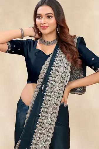 teal blue crepe silk saree with zarkan diamond work