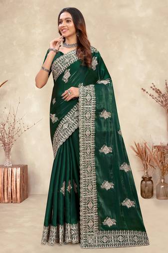 dark green crepe silk saree with coding zarkan work