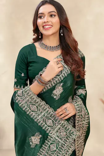 dark green crepe silk saree with coding zarkan work