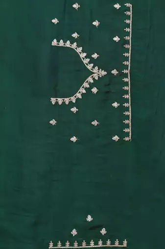 dark green crepe silk saree with coding zarkan work