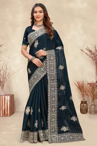 teal blue crepe silk saree with coding zarkan work