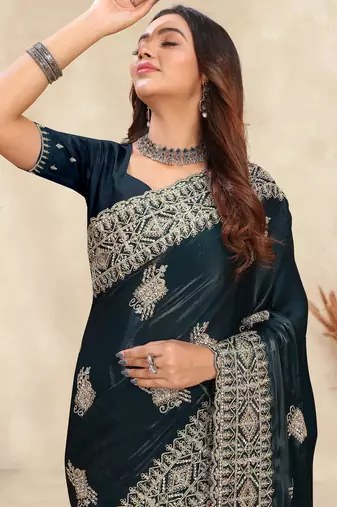 teal blue crepe silk saree with coding zarkan work