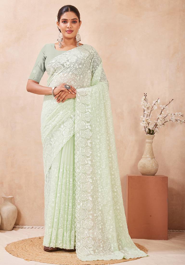 green georgette saree with zari resham sequin work