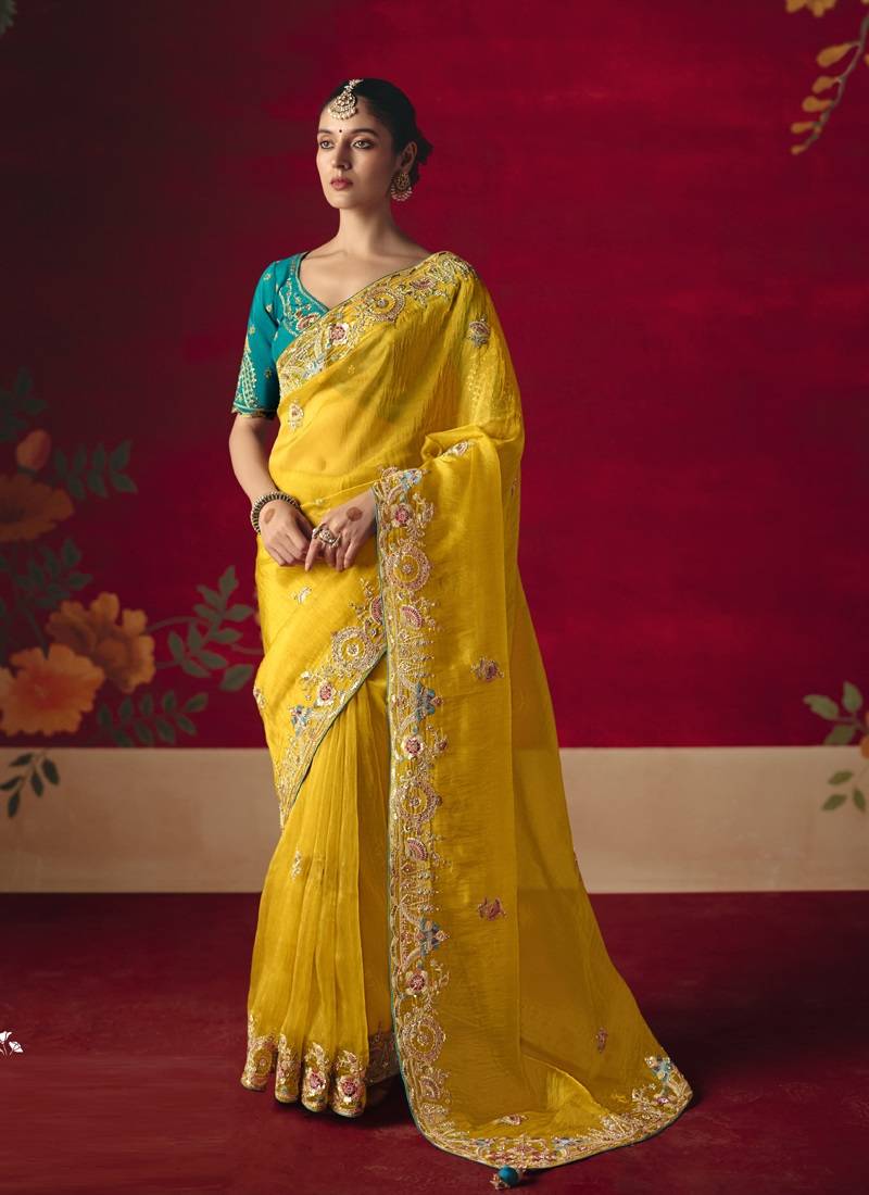 yellow fancy saree with sequins dhaga & thread embroidered butti and designer blouse