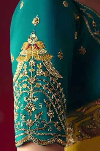 yellow silk blend saree with floral embroidery