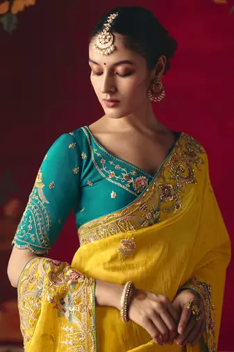 yellow silk blend saree with floral embroidery