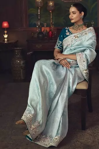 sky blue silk blend with heavy embroidery work wedding wear designer saree