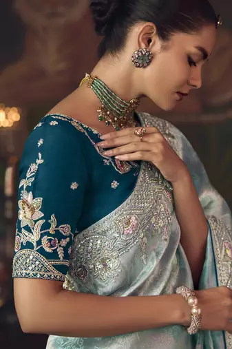sky blue silk blend with heavy embroidery work wedding wear designer saree