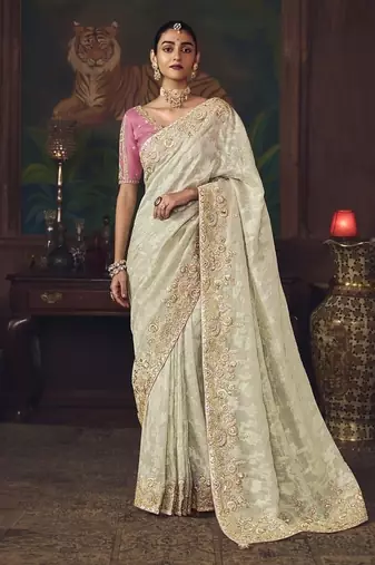 off white silk blend with heavy embroidery work wedding wear designer saree