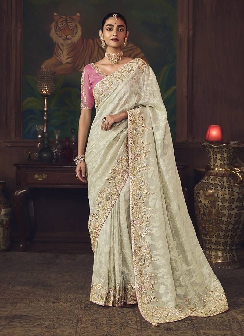 off white silk blend with heavy embroidery work wedding wear designer saree