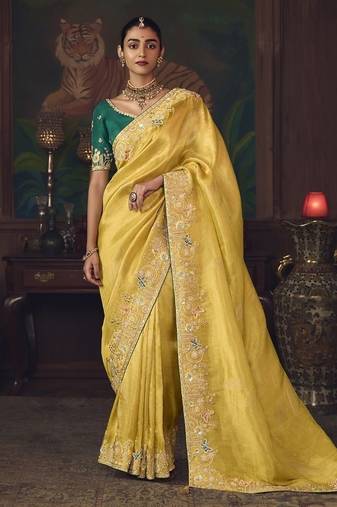 yellow silk blend with heavy embroidery work wedding wear designer saree