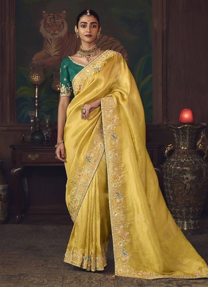 yellow silk blend with heavy embroidery work wedding wear designer saree