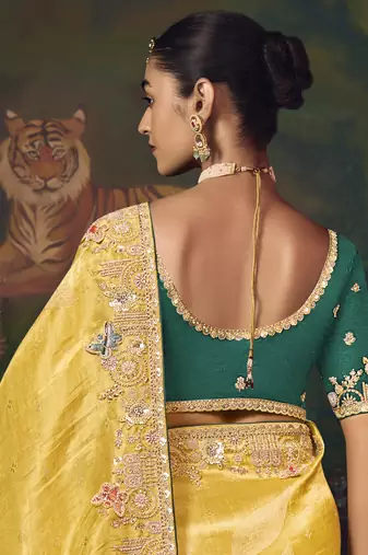 yellow silk blend with heavy embroidery work wedding wear designer saree