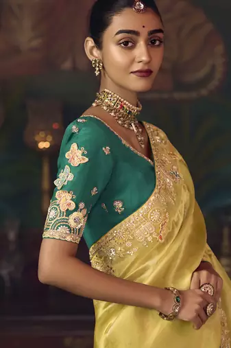 yellow silk blend with heavy embroidery work wedding wear designer saree