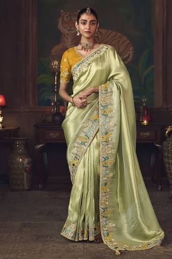 light pista silk blend with heavy embroidery work wedding wear designer saree