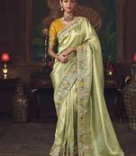 light pista silk blend with heavy embroidery work wedding wear designer saree