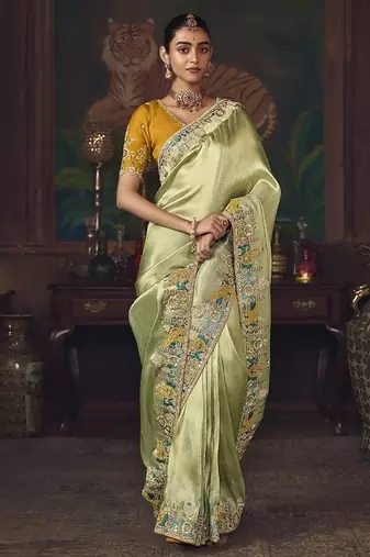 light pista silk blend with heavy embroidery work wedding wear designer saree