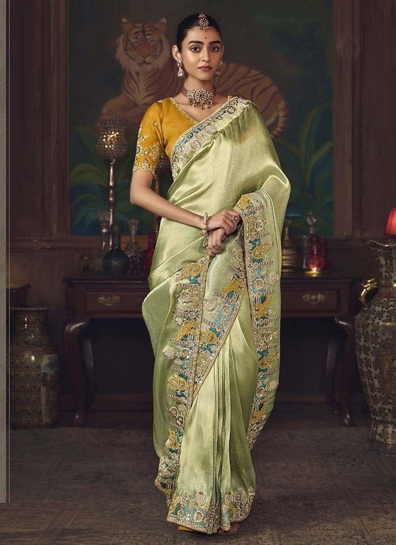 light pista silk blend with heavy embroidery work wedding wear designer saree