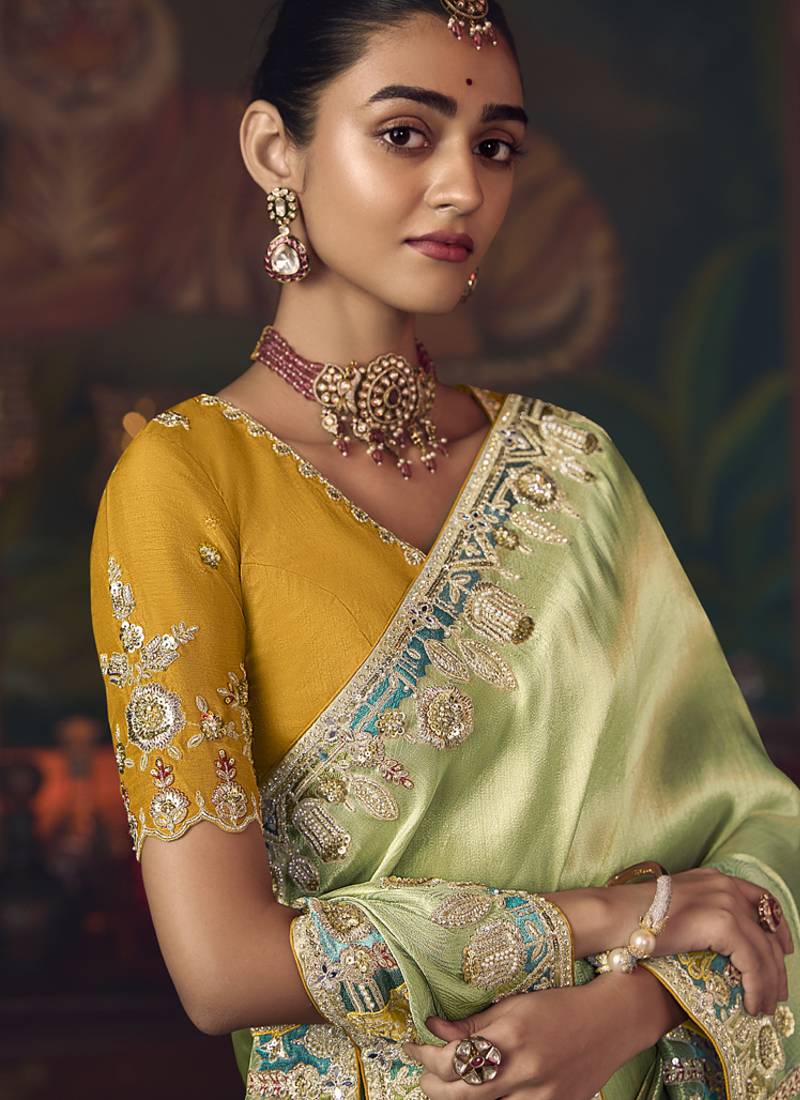 light pista silk blend with heavy embroidery work wedding wear designer saree