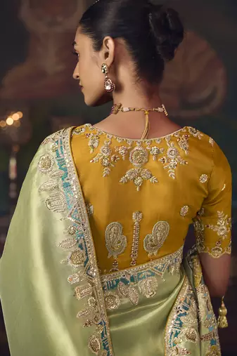 light pista silk blend with heavy embroidery work wedding wear designer saree