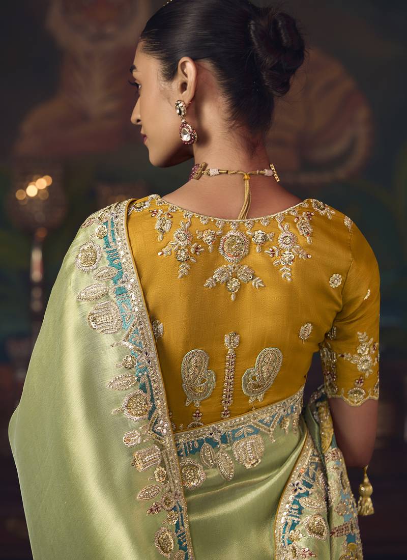 light pista silk blend with heavy embroidery work wedding wear designer saree