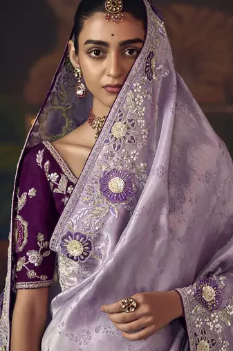 lavender silk blend with heavy embroidery work wedding wear designer saree