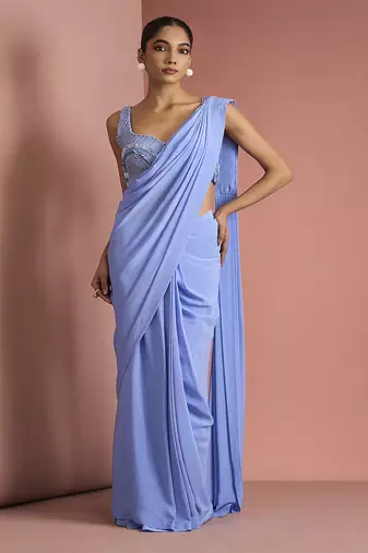 Blue crepe drape saree with pearl work blouse