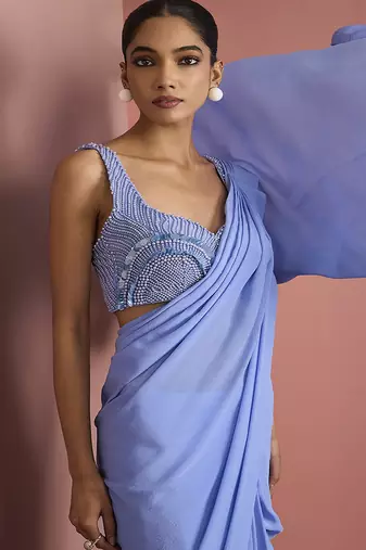 Blue crepe drape saree with pearl work blouse